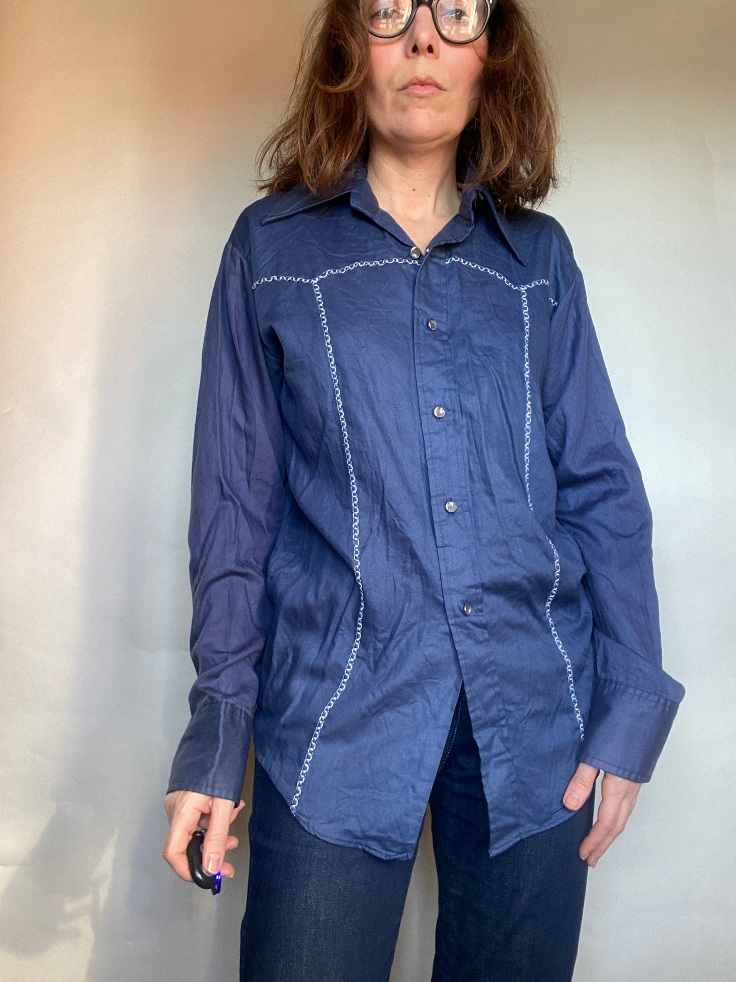 Camicia blu impunture