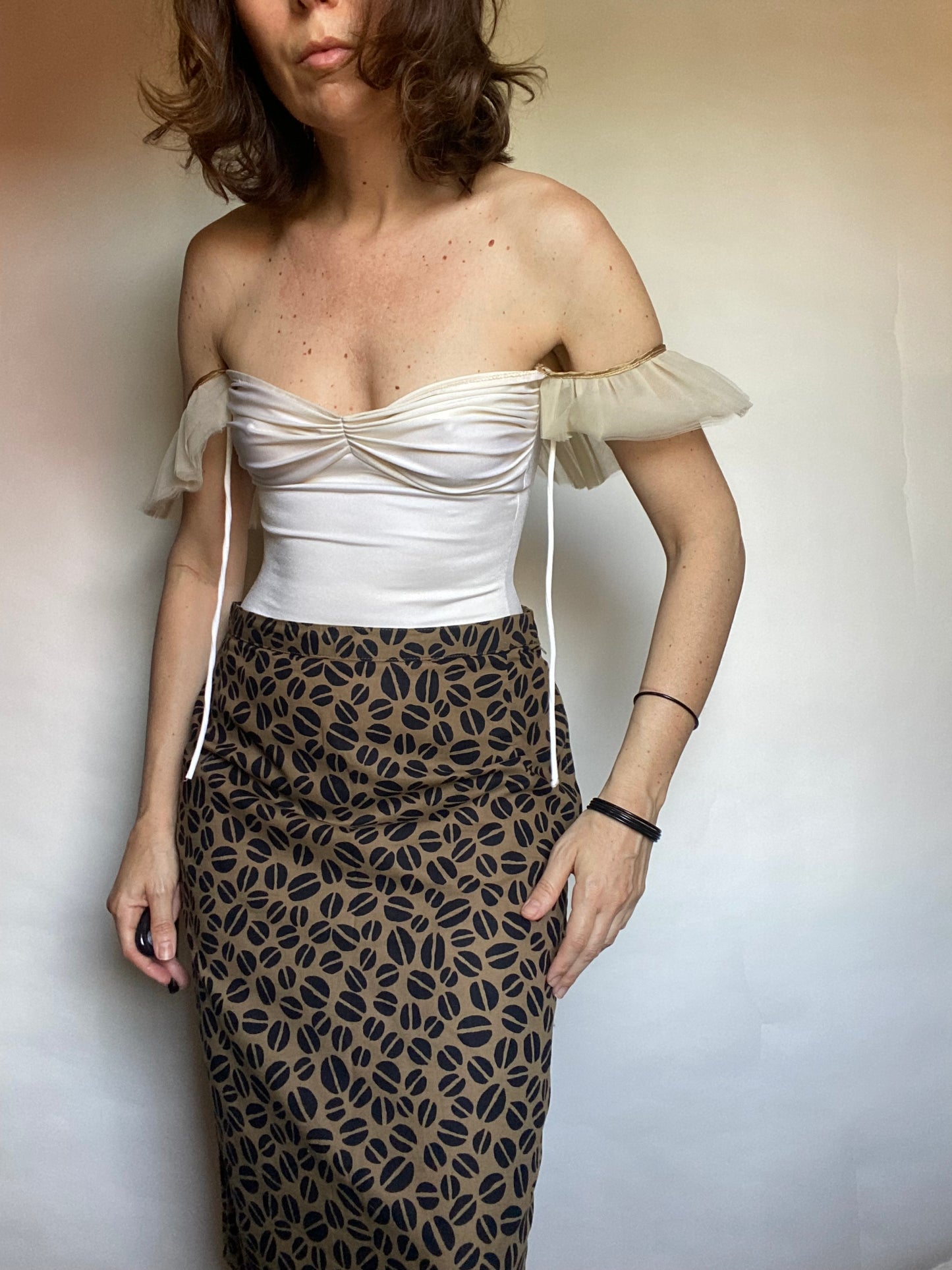 Costume con maniche tulle