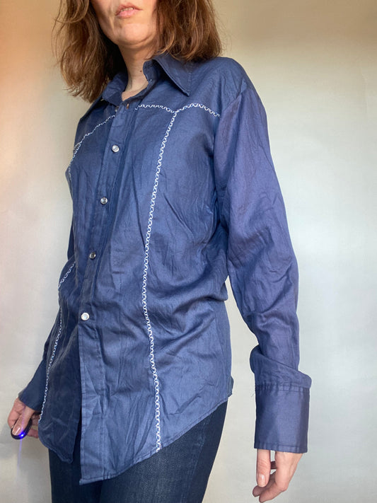 Camicia blu impunture