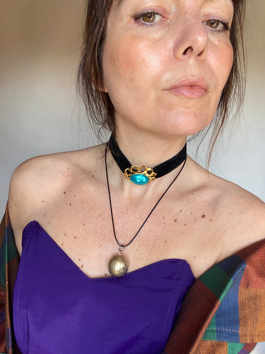 Collana con sfera sonaglio