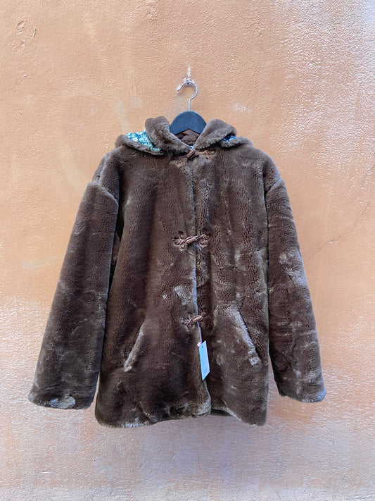 Eco pelliccia con cappuccio