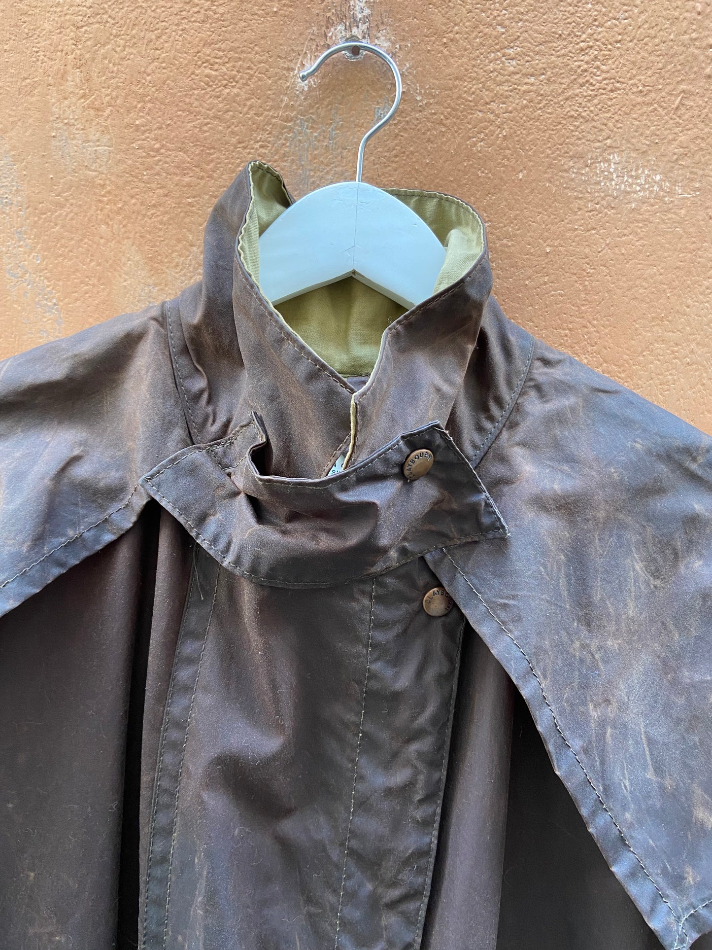 Impermeabile con mantella